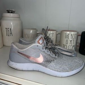 Rose gold Nike shoes